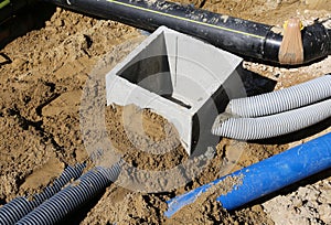 Corrugated pipes for electrical cables and a cockpit in concrete