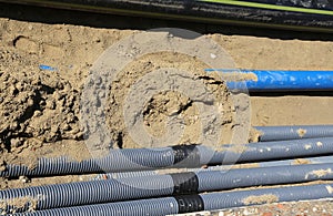 Corrugated pipes for laying electric cables in the excavation