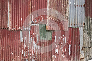 Corrugated red metal wall background texture