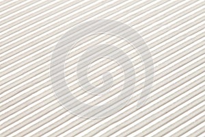 A white corrugated paper background texture.