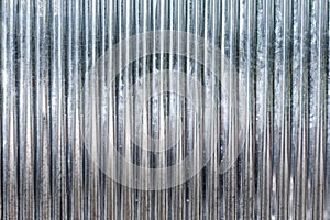 Corrugated zinc metal texture may be used as background photo