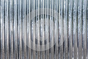 Corrugated zinc metal texture may be used as background