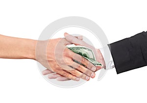 Corruption concept. Handshake with cash transfer