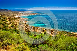 Corsica coastline with rocky beach and tourquise clear water near Ajaccio, Corsica, France, Europe. photo
