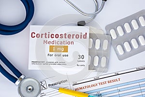 Corticosteroid medication or drug concept photo. On doctor table lies open packaging labeled `Corticosteroid medication` and fell