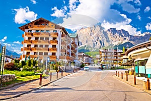 Cortina D` Ampezzo street and Alps peaks view