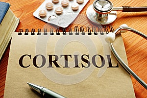 Cortisol hormone on the sheet with stethoscope