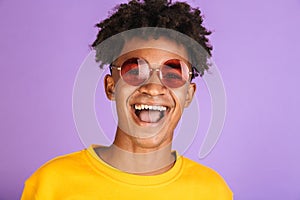 Cose up portrait of a happy young afro american man