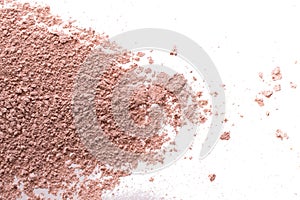 Cosmetic background, minerl clay texture. Pink ask dry clay for facecare and bodycare. Isolated on a white