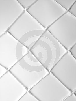 Cosmetic background white isolated from cotton pads and cotton swabs