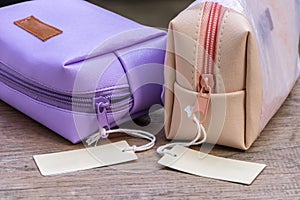 Cosmetic bags with blank brown tag