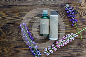 Cosmetic bottle containers with hermal camomile flowers Blank label for mock-up