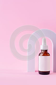 Cosmetic bottle with serum in arch. Skin care cosmetic. Hyaluronic acid oil, serum with collagen and peptides