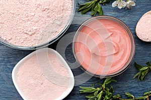 Cosmetic clay. Pink cosmetic clay in different types on a blue wooden table. face mask and body. care products. spa. top view