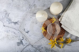 Cosmetic containers with cream and lotion and spring flowers