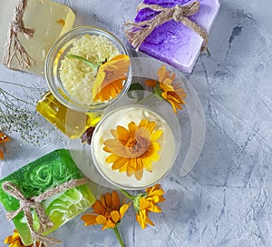 Cosmetic cream essential , freshness relaxation calendula flower soap on concrete background