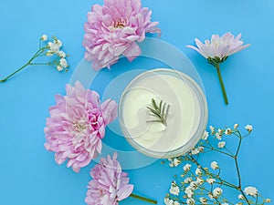 Cosmetic cream, flower relaxation organic moisturizer skin on a colored background product