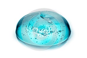 Cosmetic Cream Gel Texture Isolated On White Background. Close Up Of Green Transparent Drop Of Skin Care Product. High