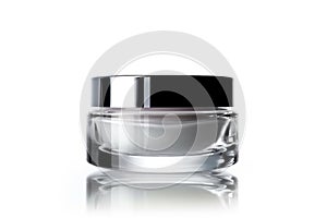 a Cosmetic cream jar on white background with reflection and shadow