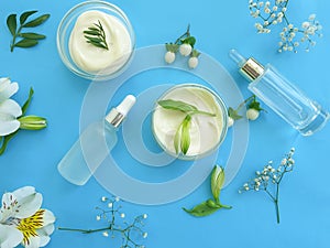 Cosmetic cream, moisturizing cleansing lifestyle floral design flower spring on a colored background