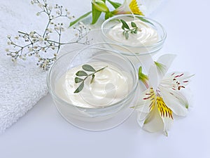Cosmetic cream organic wellness , flower on a background product
