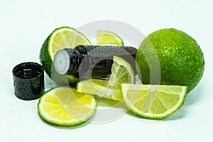 Cosmetic cream for skin care in a jar with lime. Moisturizing cream. close-up of body lotion, cream and lime on the table.