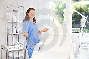 Cosmetic doctor stands confidently photo
