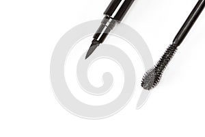 Cosmetic eyeliner with mascara brush