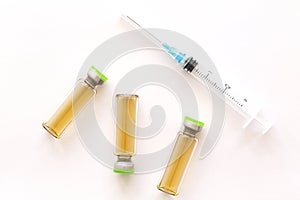Cosmetic injections bottle - botox, filler, collagen and hyaluronic acid solution. Injection cosmetology. photo