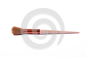 Cosmetic makeup brush isolated on white background.