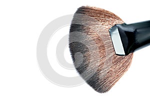 Cosmetic makeup brush on white blackground close up