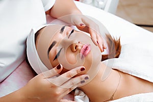 Cosmetic massage, facial treatment.