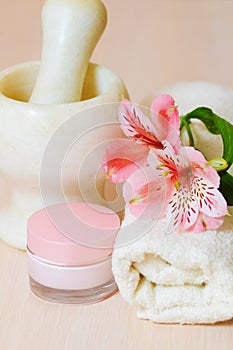 Cosmetic moisturizing cream towels and flower