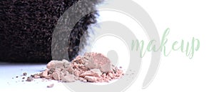 Cosmetic powder with makeup brush on white background