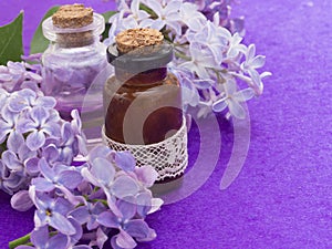 Cosmetic product with lilac flowers, fresh as spring concept