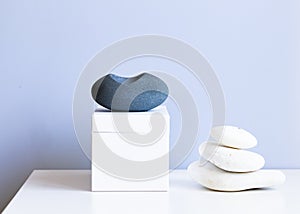 cosmetic product mock up with white boxes and vase