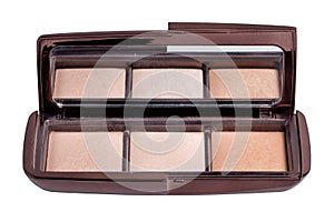 Cosmetic products isolated. Closeup of a elegant cosmetic box with cheek or face powder. Make-up isolated on a white background.