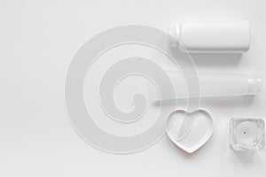 Cosmetic set for skin care on white background top view mock-up