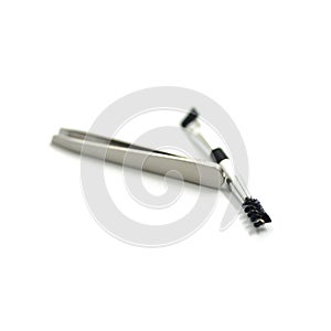 Cosmetic set : spoolie brush, tweezers, angled brush isolate on