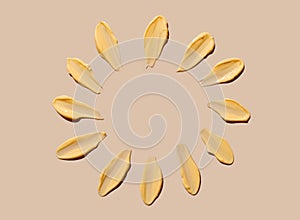Cosmetic smear of cream texture in the form of rays of the sun on a beige background. Sunscreen cream