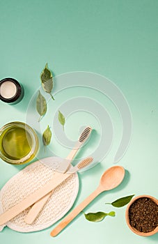 Cosmetic sours for the body, against a mint background photo