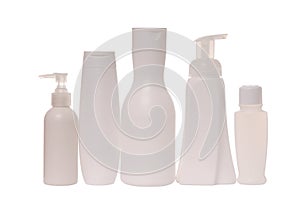 Cosmetic tare, white bottles for shampoo and hair conditioner;