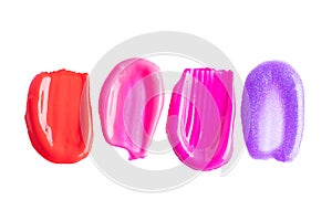 Cosmetic texture smudge pink, red, purple liquid lipstick. Swatches isolated on white. A smears of lipstick or nail polish