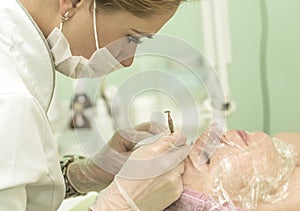 The cosmetician in a beauty salon