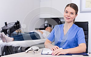 Cosmetician prescribing procedures to senior lady