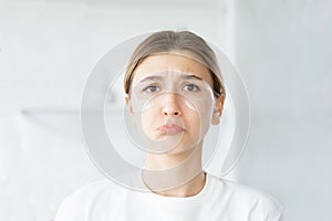 cosmetics allergy sensitive skin sad woman face
