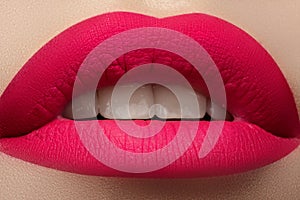 Cosmetics. Beautiful fashion bright pink lips mat make-up