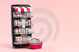 Cosmetics and beauty products buying online concept. Shopping basket with makeup products and mobile phone as shelf full of