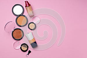 Cosmetics for face complexion on pink background