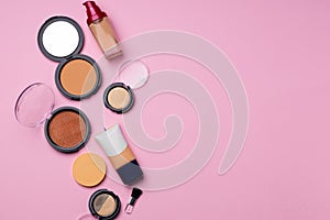 Cosmetics for face complexion on pink background